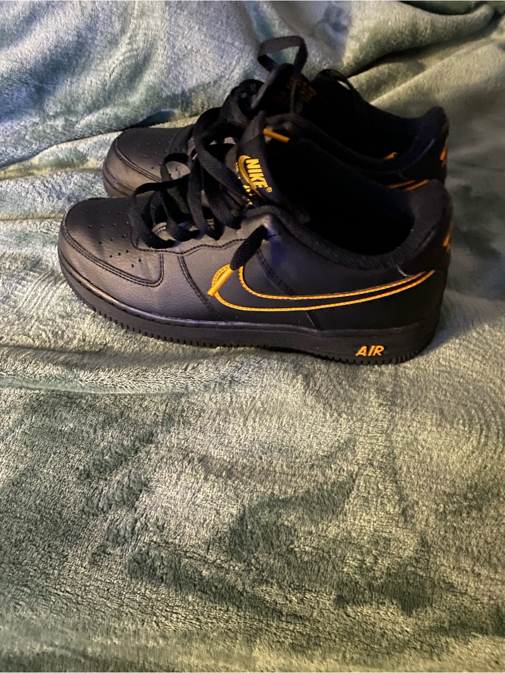 Nike Kids Black Sneakers with Orange Swoosh